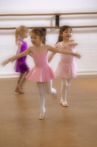 Little Girls Practice At Ballet Class